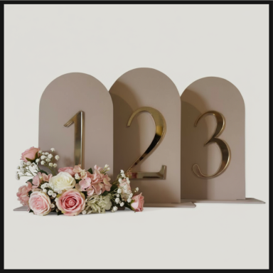 A decorative table setting with numbers 1, 2, 3 and a floral arrangement.